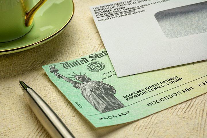 Spend money on economic impact payment debit card